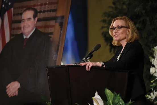 Justice Joan Larsen of the Michigan Supreme Court, an adjunct professor  at Michigan Law and a former clerk for the late Associate Justice of the  U.S. Supreme Court Antonin Scalia, speaks at his memorial service.