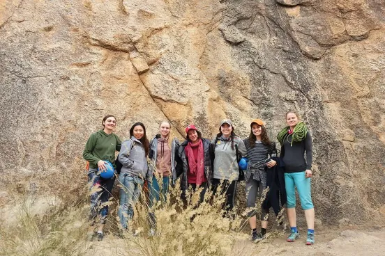 Picture of a group, Michigan law, students rock climbing in Namibia
