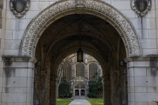 Stunning image of the iconic Law School arches leading the way into the prestigious Law Quad, a breathtaking beauty that captures the essence of legal scholarship and tradition.