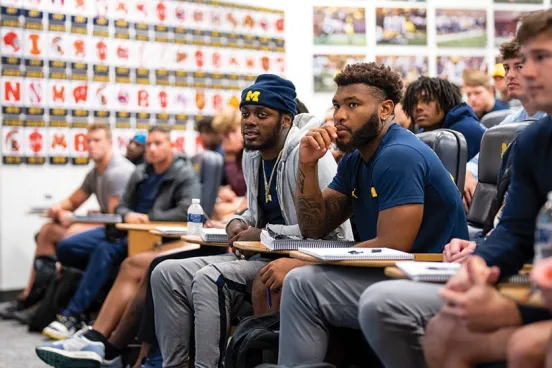 University of Michigan athletic Students in a classroom