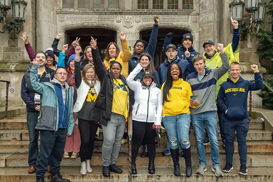 Group of people posing together.