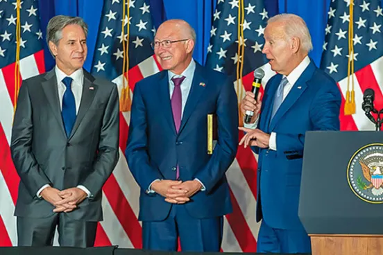 A portrait of Kenneth Salazar with the president of the United States.