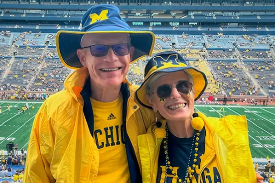 Bill, ’71, and Cindy Rainey at a Michigan football game.