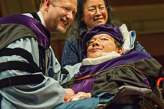 Chen Chun-han, LLM ’17, SJD ’22, at his 2017 LLM graduation with then Dean Mark West and his mother, who accompanied him on all his trips to Ann Arbor.