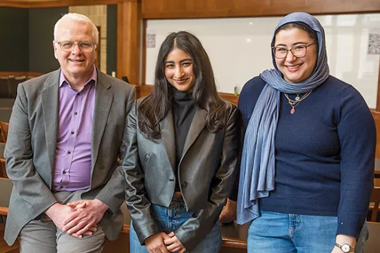 Professor Frank Vandervort met weekly with Nithya Arun (center) and Hiba Dagher as they worked on their guardian ad litem case.