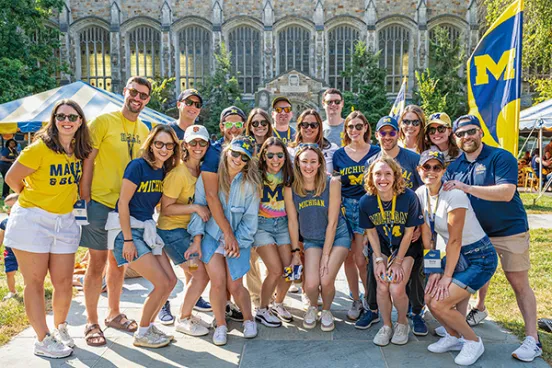 Michigan Law alumni gather in the Law Quad for an alumni reunion.