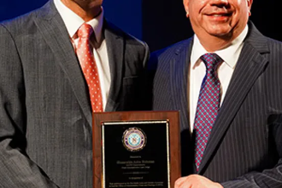 Asim Rehman receives award