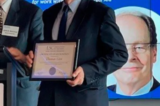 Thomas Linn receives the 2025 Pro Bono Service Award from the Legal Services Corporation.