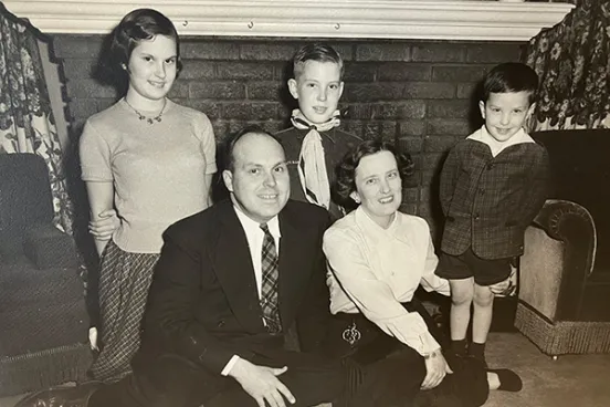 Charles “Charley” Knox, ’73, with his father, William W. Knox, ’35, and the rest of their family in the early 1950s.