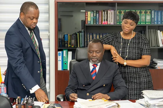 Dominic Akuritinga Ayine, LLM ’98 with Justice Srem-Sai and Exorm Azuma