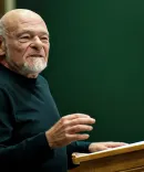 Sam Zell stood at a lectern