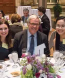 Adelman Scholarship recipients at table with donor
