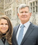 Chris and Lisa Jeffries standing in front of  Jeffries Hall 