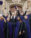 First Class of MACL Graduates. Throwing up their hats with excitement. 