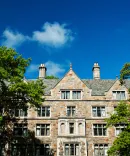 Beauty image of the law school through lush green trees