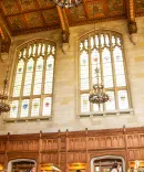 Beautiful image of the law school reading room windows from when you're walking up from the underground library