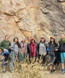 Picture of a group, Michigan law, students rock climbing in Namibia