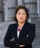 Nadia Shihata, standing in front of a court house 