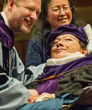 Chen Chun-han, LLM ’17, SJD ’22, at his 2017 LLM graduation with then Dean Mark West and his mother, who accompanied him on all his trips to Ann Arbor.