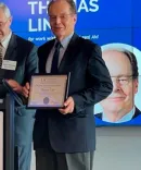 Thomas Linn receives the 2025 Pro Bono Service Award from the Legal Services Corporation.