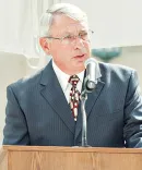 Bruce Bickner, ’68, speaks at the dedication ceremony for South Hall (now Jeffries Hall) in 2012.