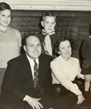 Charles “Charley” Knox, ’73, with his father, William W. Knox, ’35, and the rest of their family in the early 1950s.