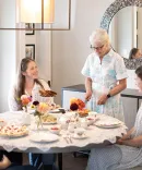 Ginny Miller, Shannon Hickey, Ellen Chirikos, and Aoife Bennett having “Afternoon Tea with Professor McCrudden and His Wife, Caroline”