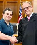 The Hon. J. Chris Larson, ’99 and Andrew